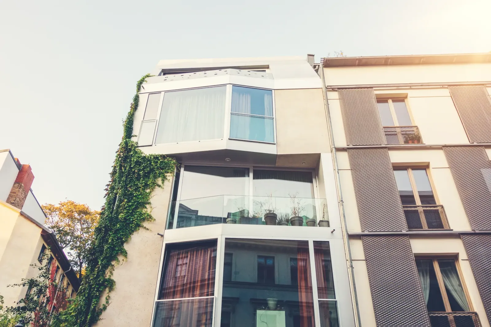 Mixed-use apartment building with large panoramic windows